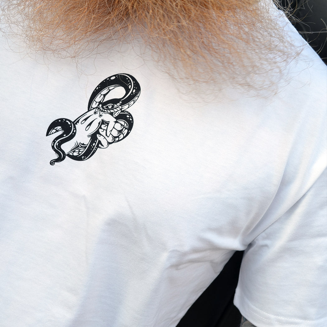 White t-shirt with a black snake and hand design on the chest